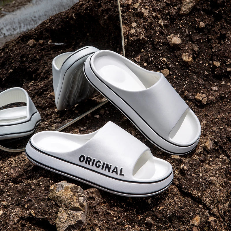 Feslishoet-Zapatillas de playa con letras para hombre y mujer, chanclas antideslizantes de suela gruesa de Color sólido para interior y baño, sandalias de verano para parejas